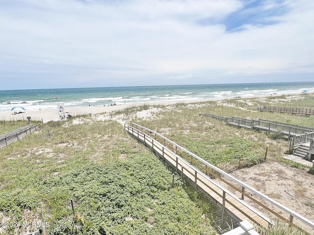 view of water feature with a beach view