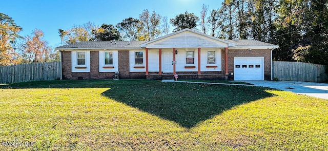 ranch-style home featuring a porch, a garage, and a front yard