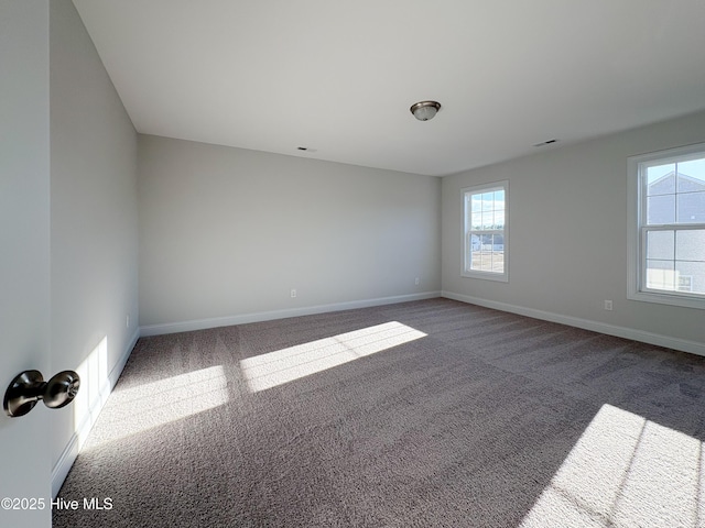 unfurnished room with carpet