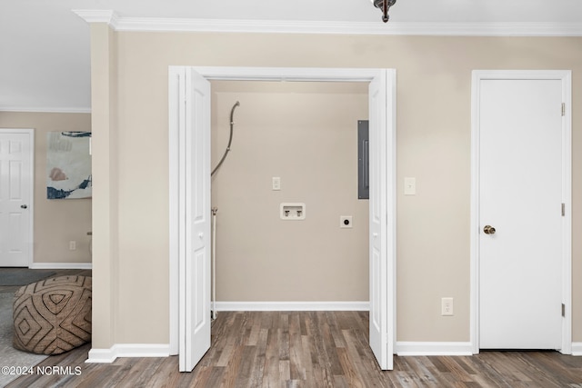 clothes washing area with dark hardwood / wood-style floors, hookup for a washing machine, ornamental molding, and hookup for an electric dryer