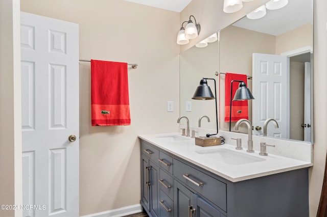 bathroom with double sink and oversized vanity