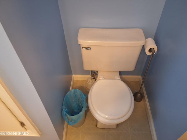 bathroom featuring tile patterned floors and toilet