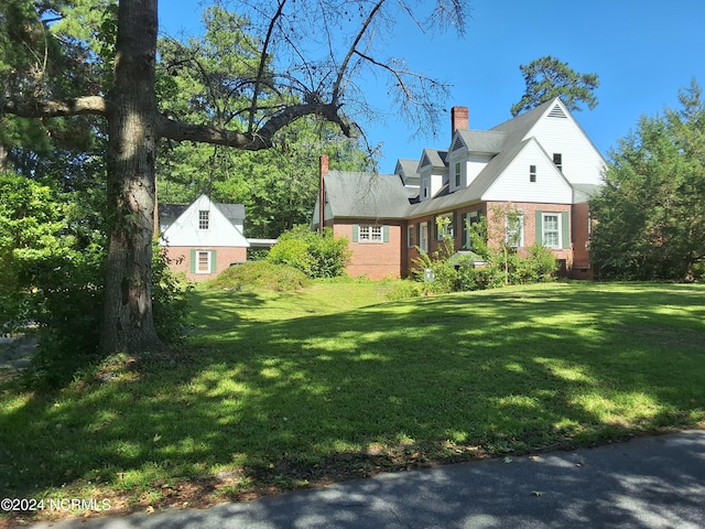 exterior space with a yard