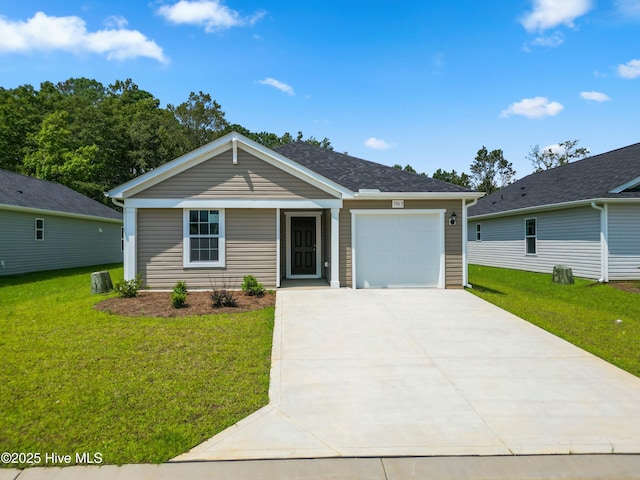 view of front of home featuring a garage and a front yard