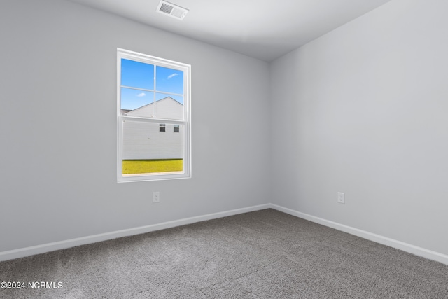 empty room with carpet flooring