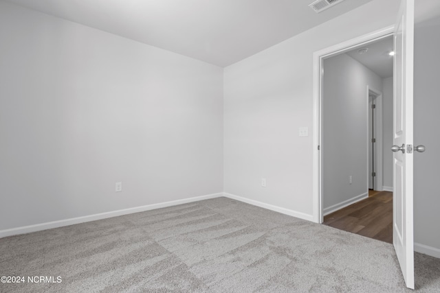 empty room featuring carpet flooring