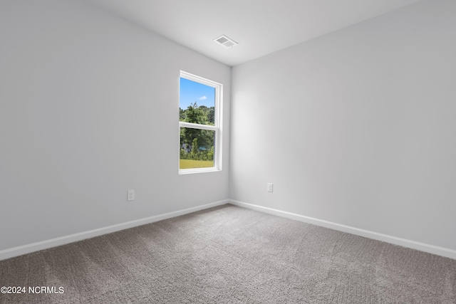 empty room featuring carpet flooring