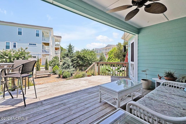 wooden terrace with ceiling fan