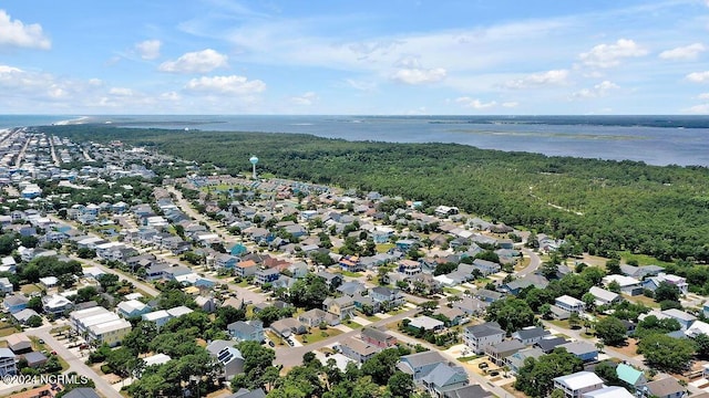 bird's eye view with a residential view and a water view