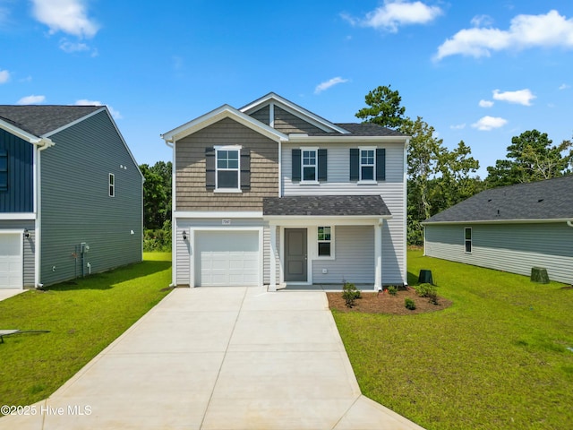 view of front of property with a front lawn and a garage