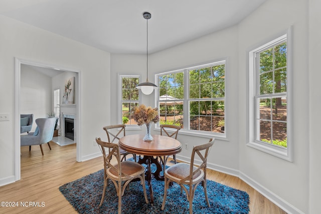 dining area featuring light wood-type flooring