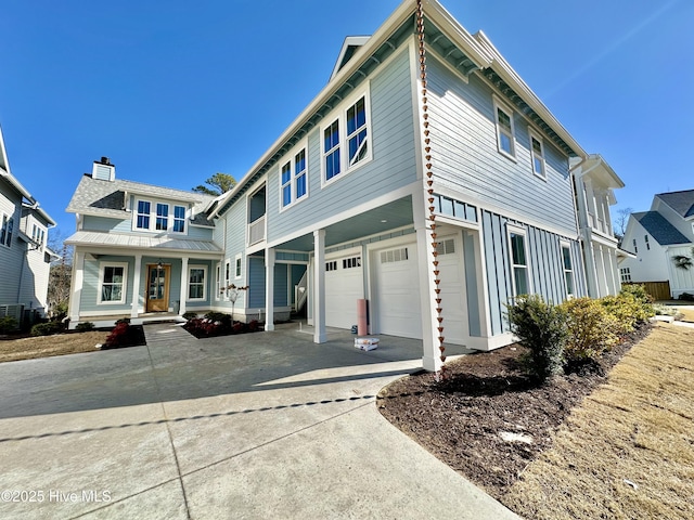 view of front facade featuring a porch and a garage