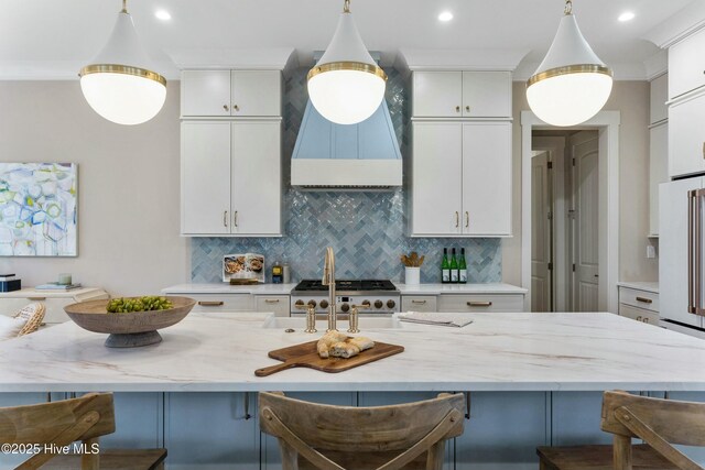 kitchen with white cabinetry, high end white refrigerator, and dark hardwood / wood-style flooring