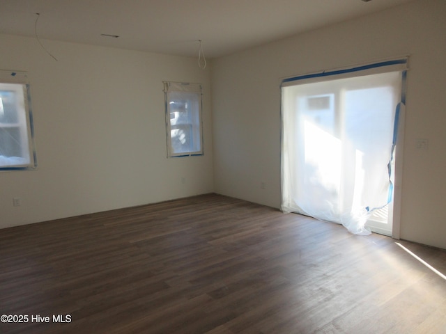 unfurnished room featuring hardwood / wood-style floors