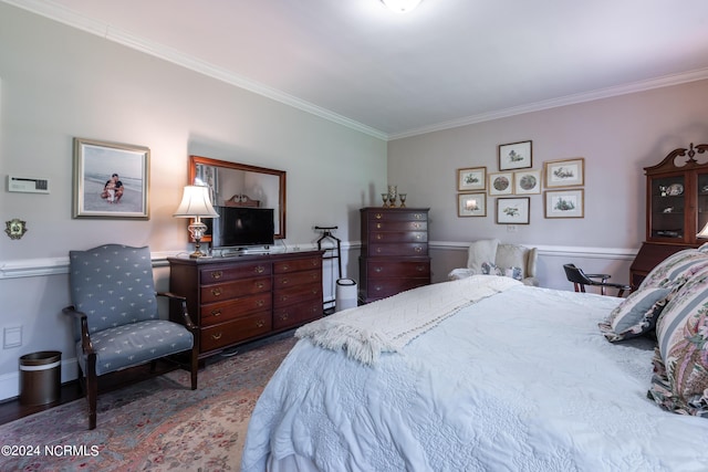 bedroom with ornamental molding