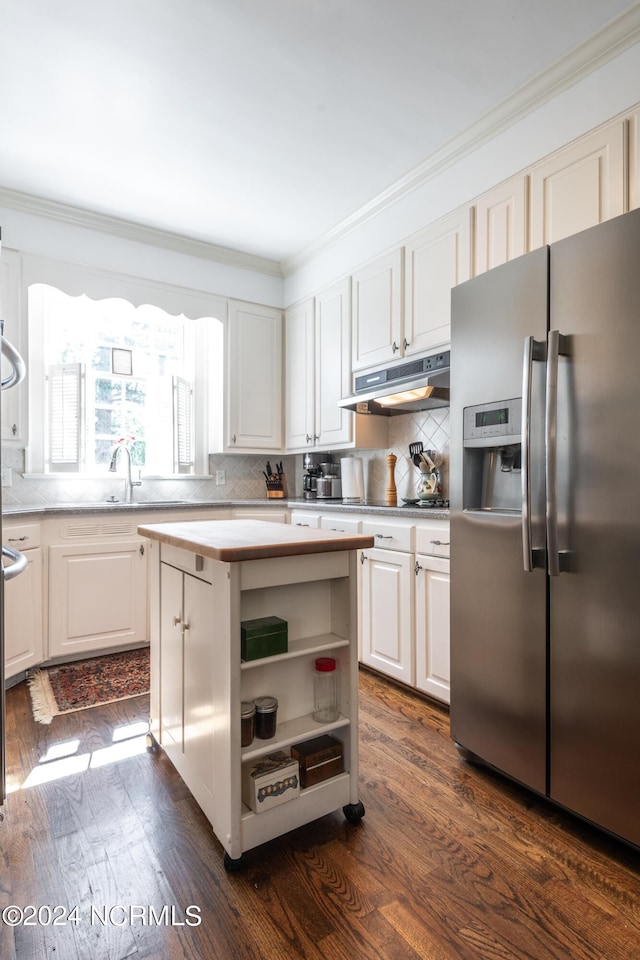 kitchen featuring stainless steel fridge with ice dispenser, a center island, dark hardwood / wood-style floors, and white cabinetry