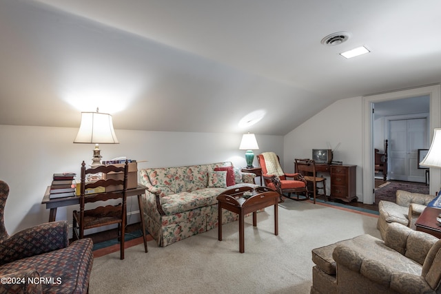 living room with carpet and vaulted ceiling