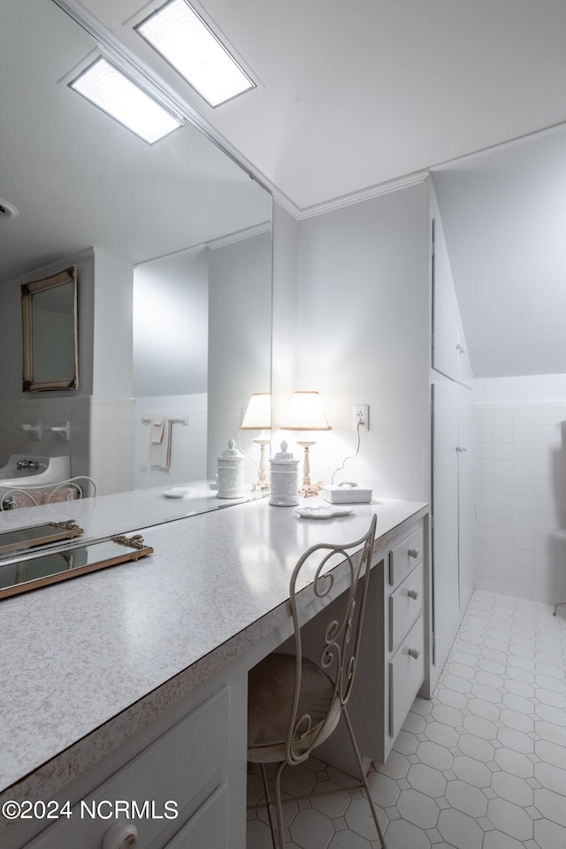 bathroom with tile walls