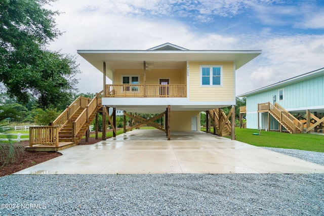 coastal home featuring a carport