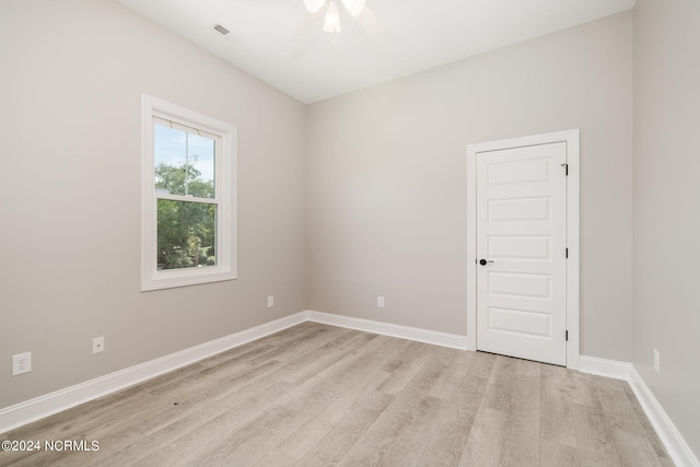 unfurnished room with light hardwood / wood-style flooring