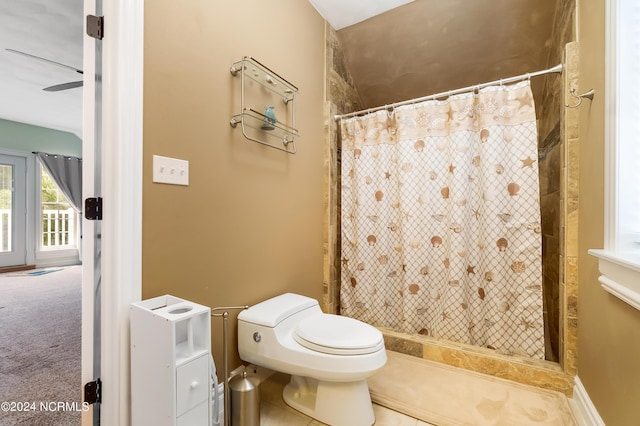 full bathroom featuring toilet and a shower with curtain