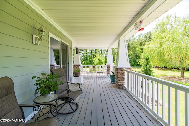 wooden deck with a porch