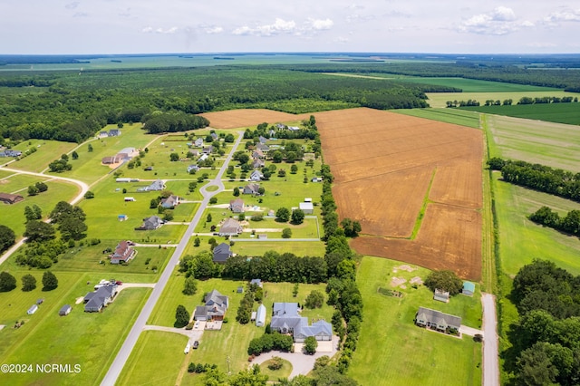 birds eye view of property with a rural view