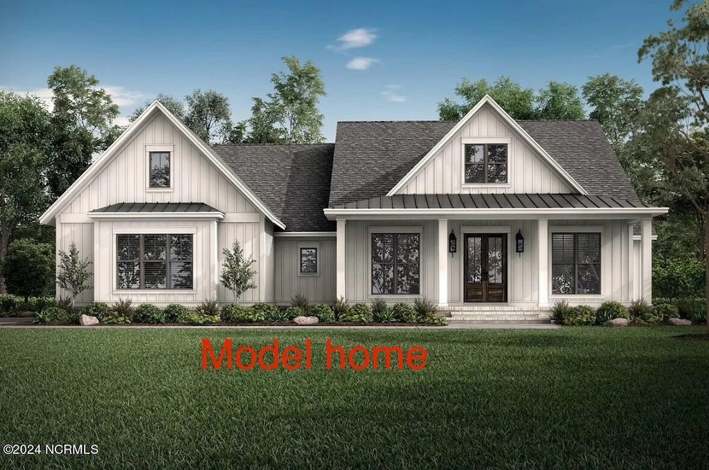 462 Shiloh Ln SE, Bolivia, NC 28422 - modern farmhouse with a standing seam roof, a shingled roof, board and batten siding, metal roof, and a front lawn