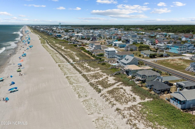 aerial view with a view of the beach and a water view