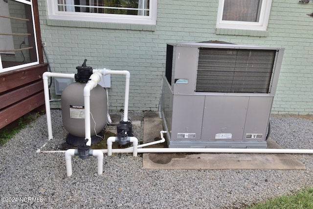 exterior details featuring cooling unit