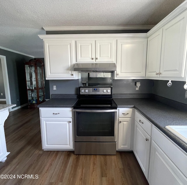 kitchen featuring dark wood-type flooring, white cabinetry, crown molding, and stainless steel electric range