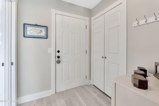 entrance foyer featuring light hardwood / wood-style floors