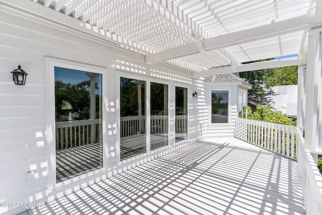 wooden deck with a pergola