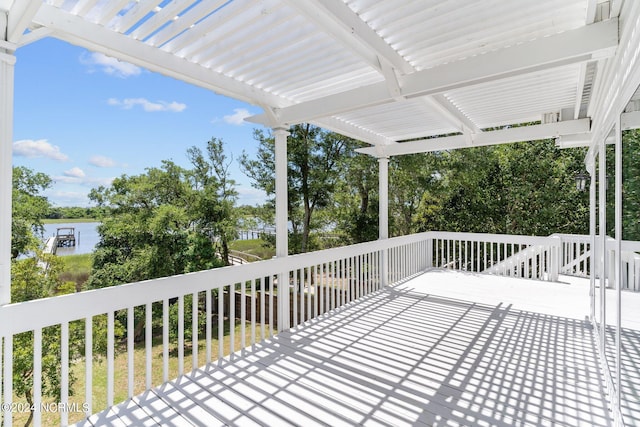 wooden deck featuring a pergola