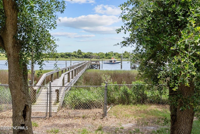 dock area with a water view