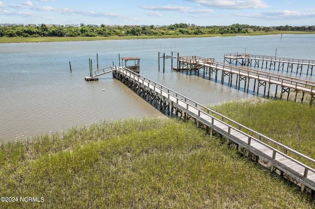 dock area featuring a water view