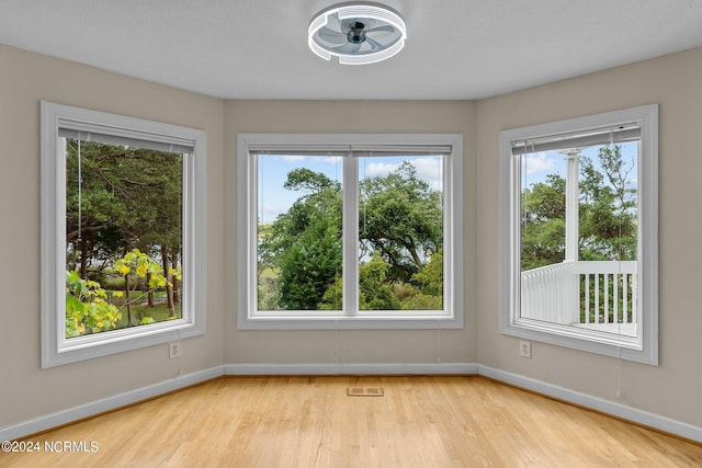 empty room with light wood-type flooring