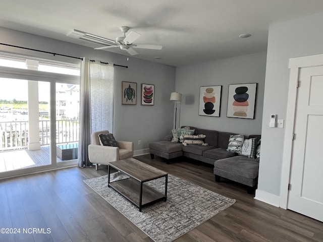 200 Olde Towne Yacht Club Dr Unit 34, Beaufort, NC 28516 - living area featuring dark wood-style flooring, baseboards, and a ceiling fan