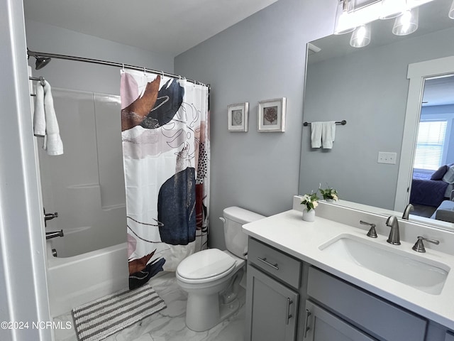 full bathroom featuring vanity, shower / tub combo, and toilet