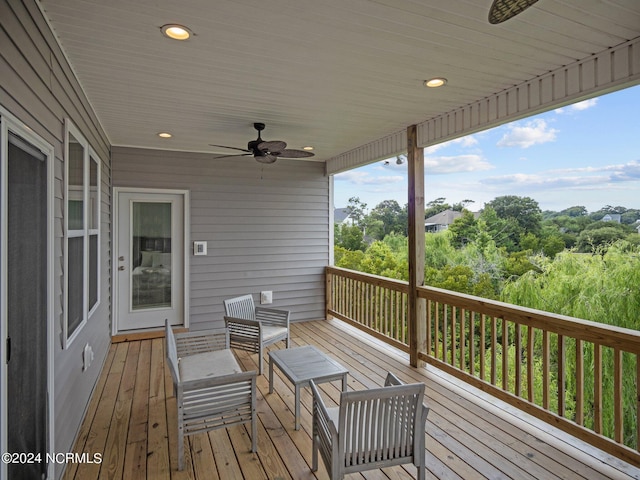 wooden terrace with ceiling fan