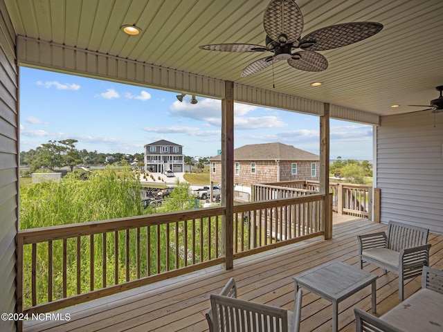 wooden deck with ceiling fan