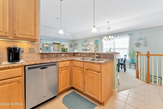 kitchen featuring dishwasher, sink, kitchen peninsula, decorative light fixtures, and ceiling fan with notable chandelier