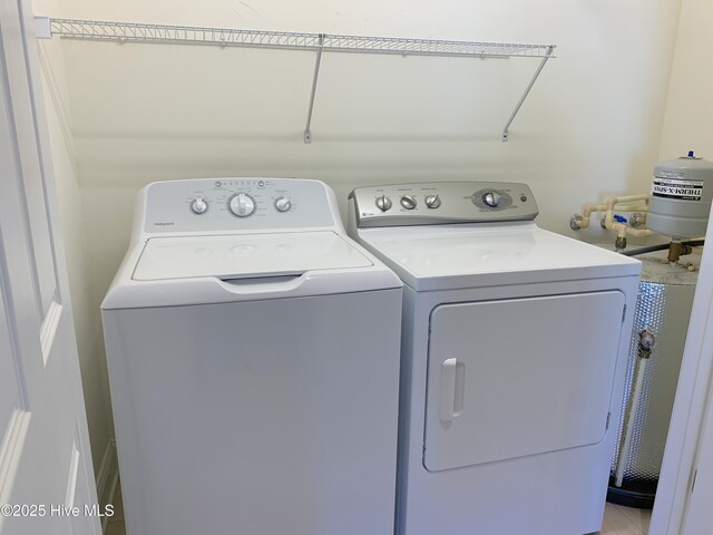 washroom with washing machine and dryer