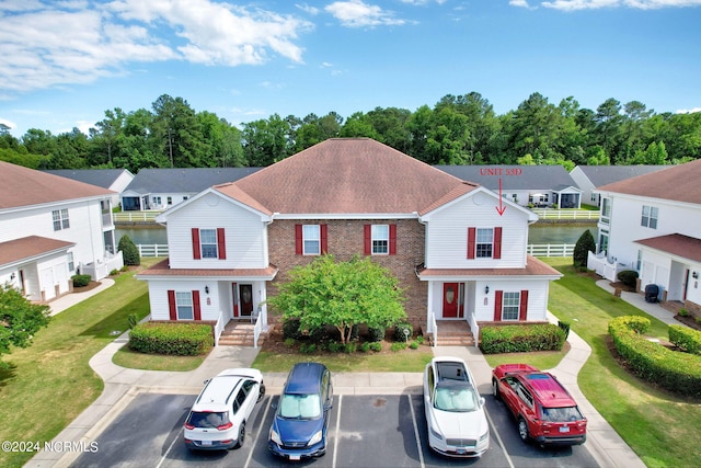 multi unit property featuring a water view