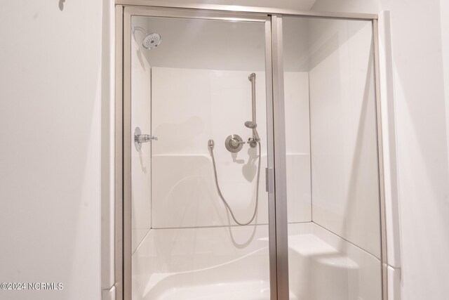 bathroom with an enclosed shower