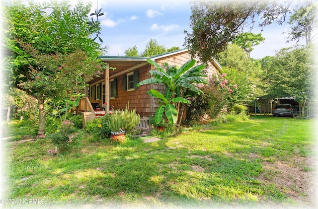 view of yard featuring a carport