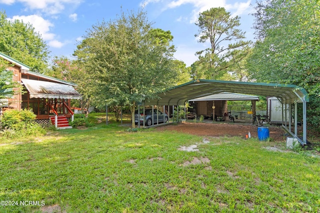 view of yard with a carport