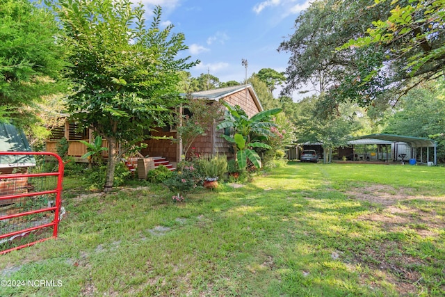 view of yard featuring a carport