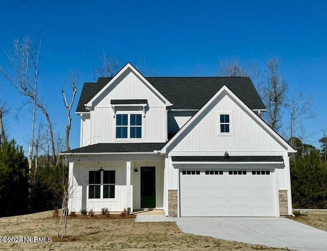 modern farmhouse style home with a garage