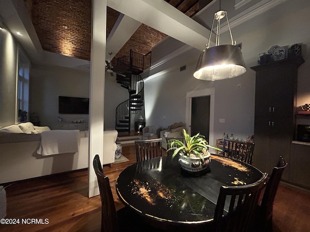 dining space with hardwood / wood-style floors